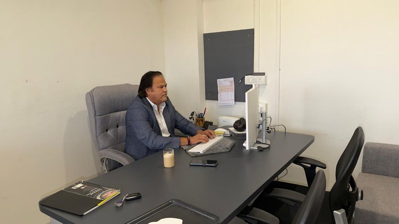 Anand Maheshwari at his office desk